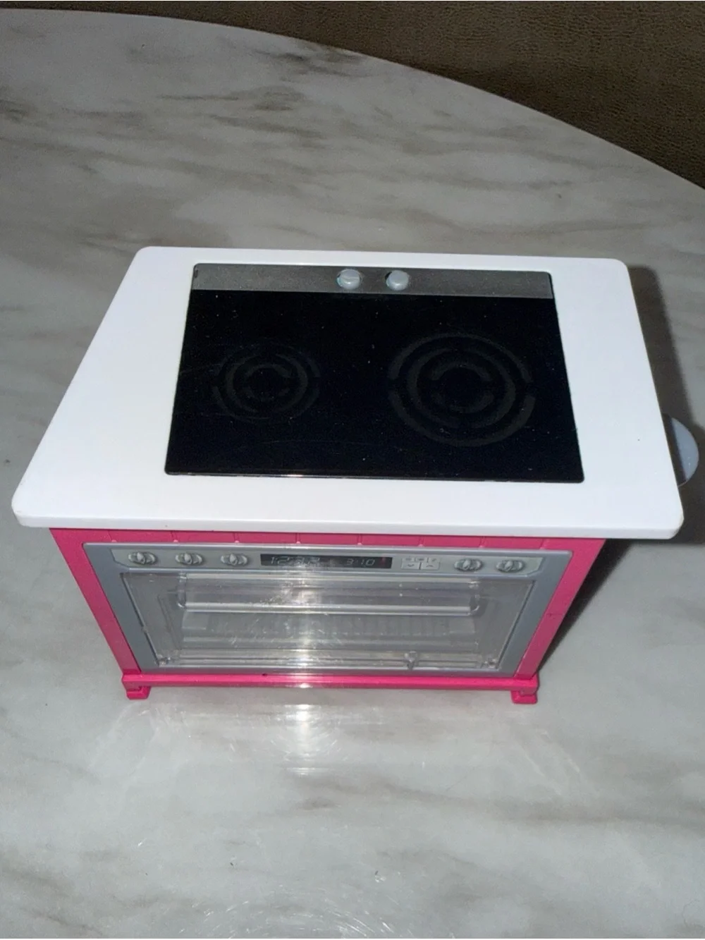 Barbie Dreamhouse stove, oven lights up and makes noise